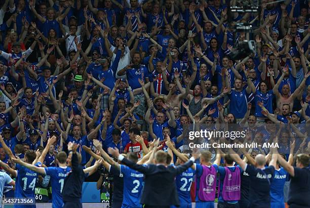 Fans of Iceland applaud their team after the UEFA EURO 2016 Round of 16 match between England and Iceland at Allianz Riviera Stadium on June 27, 2016...