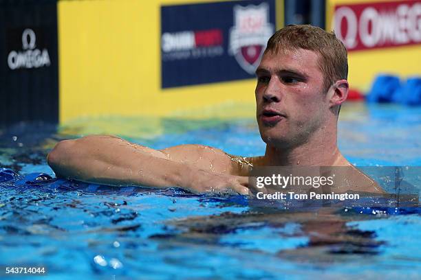 Kevin Cordes of the United States reacts after breaking a new US record after competing in a semi-final heat for the Men's 200 Meter Breaststroke...