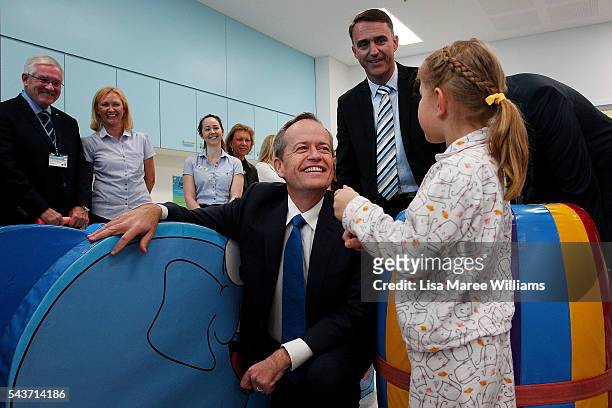 Opposition Leader, Australian Labor Party Bill Shorten visits with Azura Bakker at the Childrens Ward at Logan Hospital on June 30, 2016 in Logan,...