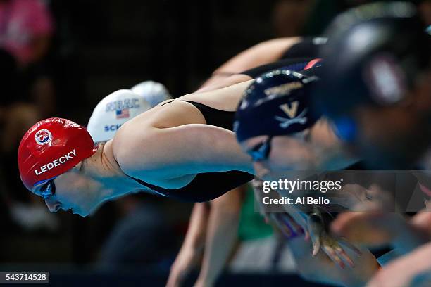 Katie Ledecky of the United States dives in to compete in a final heat for the Women's 200 Meter Freestyle during Day Four of the 2016 U.S. Olympic...