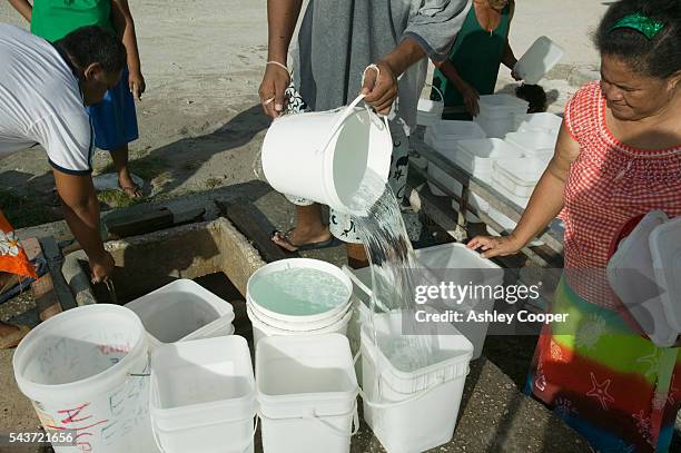 Funafuti Atoll is at the front line against global warming. 15 feet above sea level at the highest point, rising levels are putting the population of...