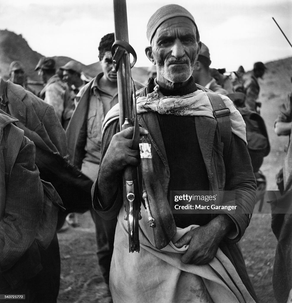 Algerian Soldier Guards Captured FLN Members