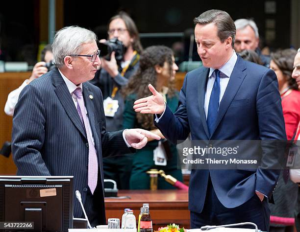 Brussels, Belgium, March 19, 2015. -- President of the European Commission Jean-Claude Juncker is talking with the United Kingdom Prime Minister...