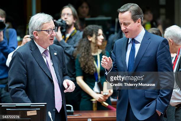 Brussels, Belgium, March 19, 2015. -- President of the European Commission Jean-Claude Juncker is talking with the United Kingdom Prime Minister...