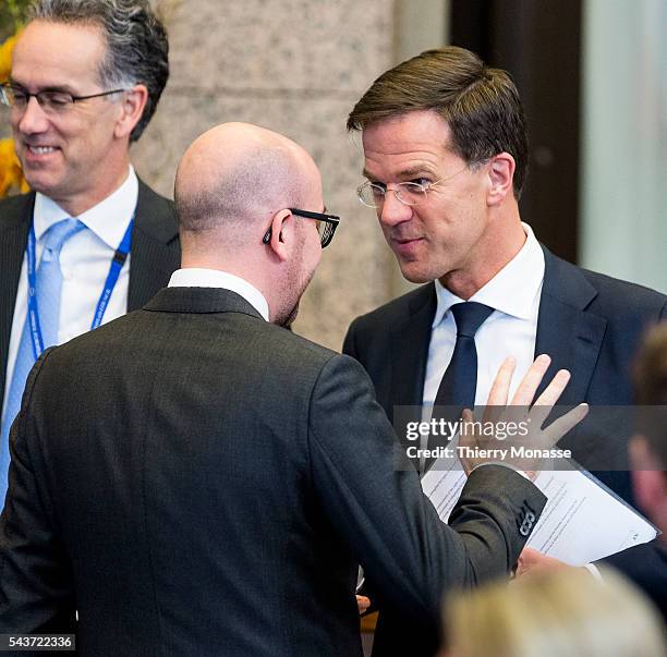 Brussels, Belgium, March 20, 2014. -- Belgium Prime Minister Charles Michel is talking with the Dutch Prime Minister Mark Rutte at the end of the...