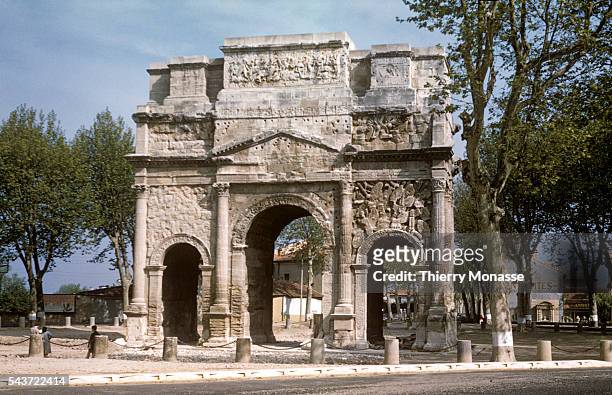 Orange, Vaucluse, Provence-Alpes-Côte d'Azur, France, Summer 1958. -- Triumphal Arch of Orange. It was built on the former via Agrippa to honor the...