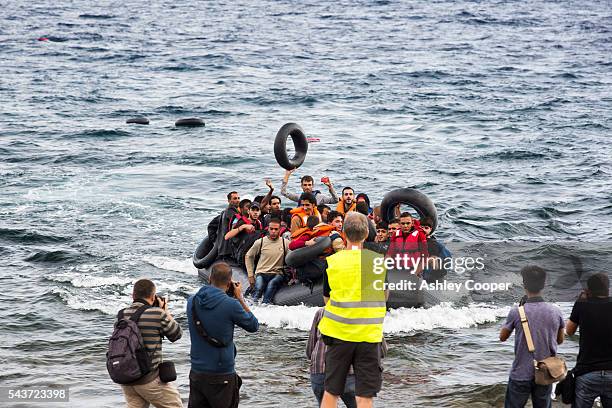 Syrian migrants fleeing the war and escaping to Europe, landing on the Greek island of Lesvos on the north coast at Efthalou. Up to 4,000 migrants a...