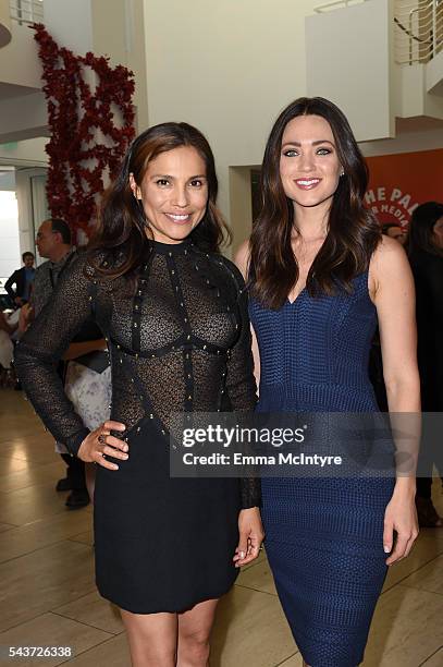 Actresses Tonantzin Carmelo and Alyssa Reeves arrive at PaleyLive LA: An Evening With '12 Monkeys' at The Paley Center for Media on June 29, 2016 in...