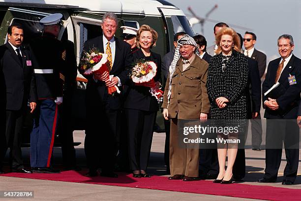 American President Bill Clinton and wife Hillary are welcomed at the Gaza airport by President of the Palestinian National Authority Yasser Arafat...