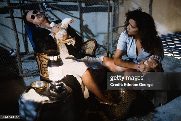 Panamanian actor Miguel Bose and Tunisian-born actress Amina Annabi on the set of La Nuit sacree, directed by Nicolas Klotz and based on the Tahar...