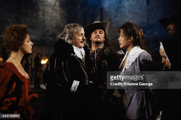 French actors Charlotte Kady, Claude Rich, X and Sophie Marceau on the set of the film La fille de d'Artagnan, directed by French director Bertrand...