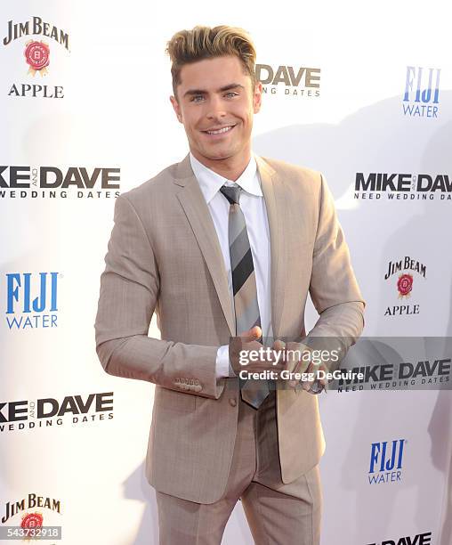 Actor Zac Efron arrives at the premiere of 20th Century Fox's "Mike And Dave Need Wedding Dates" at the Cinerama Dome at ArcLight Hollywood on June...