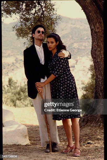 Tunisian born Actress Amina Annabi and Panamanian actor Miguel Bosé on the set of "La Nuit sacrée" directed by Nicolas Klotz, based on the Tahar Ben...