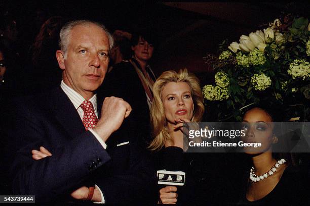 Italian jeweler and luxury goods retailer Paolo Bulgari, Actress Kim Basinger and Brandi on the set of the film Prêt-à-Porter, , directed by American...