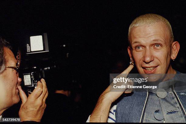 German photographer Helmut Newton and French fashion designer Jean-Paul Gaultier on the set of the film Prêt-à-Porter, , directed by American...