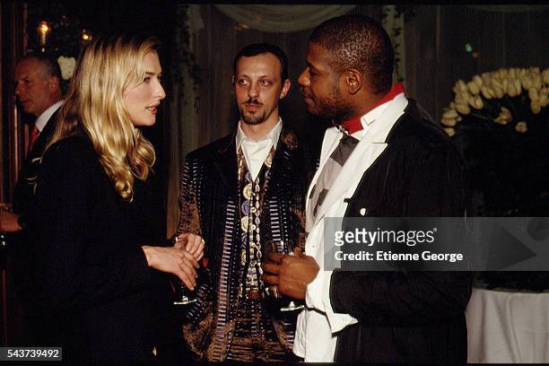 German born supermodel and actress Tatjana Patitz, French singer and composer Tom Novembre and actor Forest Whitaker on the set of the film...