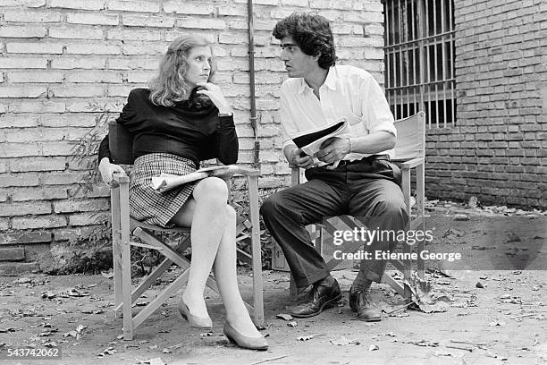 French actress Isabelle Huppert and director Ronald Chammah the set of his film "Milan noir" .