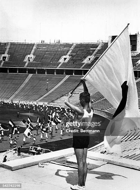 View of a recent rehearsal of the parade of nations in the Olympic stadium at Berlin.