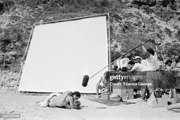 French actors Fiona Gélin and Richard Berry on the set of the film "Le Grand carnaval" , directed by Alexandre Arcady alongside cinematographer Yves...