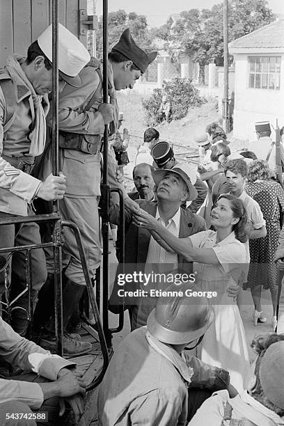 French actors Michel Creton, Patrick Bruel, Philippe Noiret and Macha Méril on the set of the film "Le Grand carnaval" , directed by Alexandre Arcady.