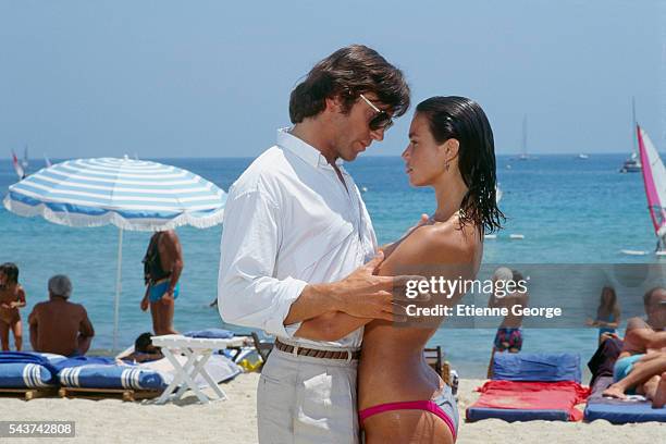 French actors Valerie Kaprisky and Bernard Giraudeau on the set of the film "L'Annee des meduses" , directed by English director Christopher Frank...