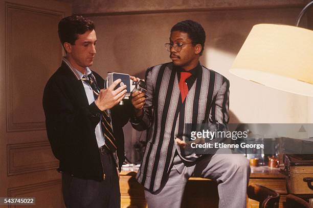 American jazz pianist and composer Herbie Hancock with French actor François Cluzet on the set of "Round Midnight" , based on the David Rayfiel...