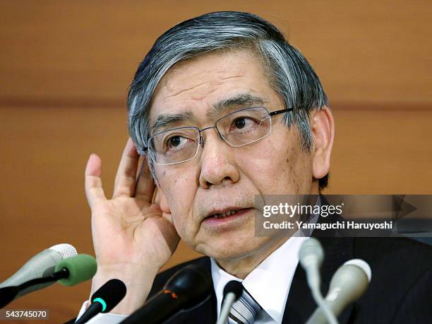 Governor of the Bank ofJapan Haruhiko Kuroda speaks during a news conference at the central bank's headquarters in Tokyo, March 11, 2014. Photo by...