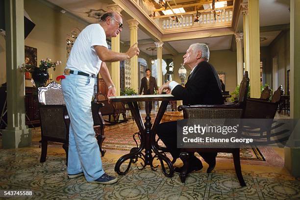 French actor Alain Cuny directed by Italian director Francesco Rosi on the set of his film "Cronaca di una morte annunciata " , based on the...