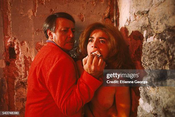 French actors Valérie Kaprisky and Roger Dumas on the set of "La Femme publique" , directed by Andrzej Zulawski.