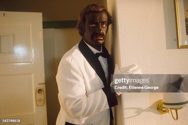 Actor Jean-Paul Belmondo with a black painted face on the set of "Itineraire d'un enfant gate", directed by Claude Lelouch. Belmondo won the 1989...