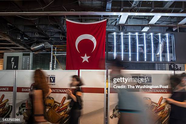 Damage from inside the airport where the bomb went off at the arrivals area of the airport. ISTANBUL, TURKEY After yesterdays attack of three bombs...
