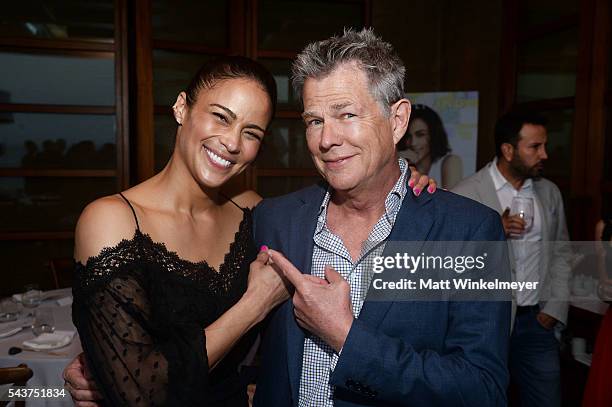 Actress Paula Patton and musician David Foster attend Jetsmarter and Tanqueray celebrate Paula Patton Haute Living Cover at Nobu Malibu on June 29,...