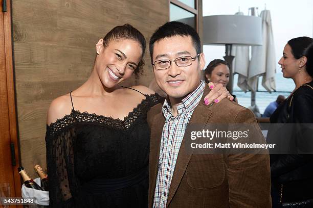 Actress Paula Patton and guest attend Jetsmarter and Tanqueray celebrate Paula Patton Haute Living Cover at Nobu Malibu on June 29, 2016 in Malibu,...