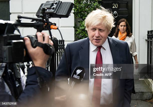Former London Mayor Boris Johnson and his wife Marina are pictured as they leave their home in London on June 30, 2016. Brexit campaigner Michael...