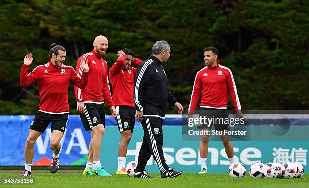 Wales players from left to right, Gareth Bale, James Collins, Neil Taylor and Hal Robson-Kanu share a joke during Wales training session ahead of...