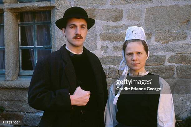 French actors Francois Cluzet and Bernadette Le Sache on the set of the film "Le Cheval d'Orgueil" , directed by French director Claude Chabrol and...
