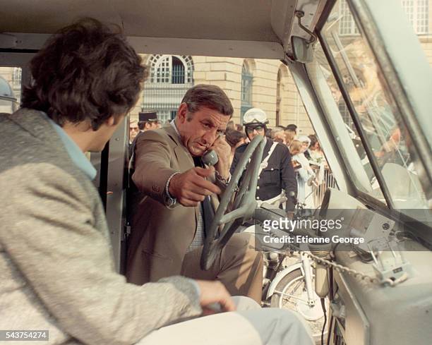 Italian-born actor Lino Ventura and French actor Patrick Dewaere on the set of "Adieu, Poulet", , directed by Pierre Granier-Deferre.