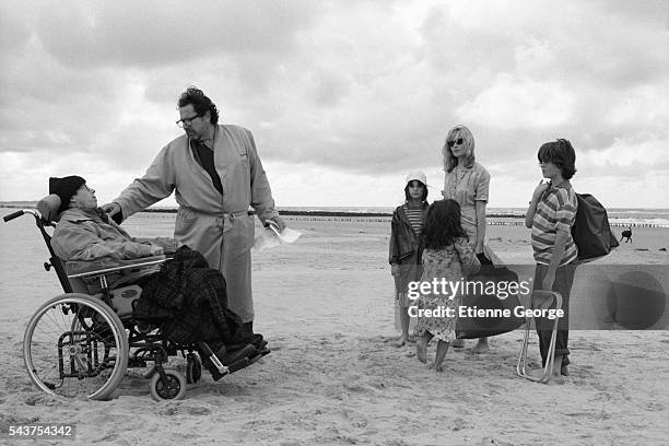 American artist, painter and director Julian Schnabel directing French actor Mathieu Amalric and French actress Emmanuelle Seigner on the set of his...