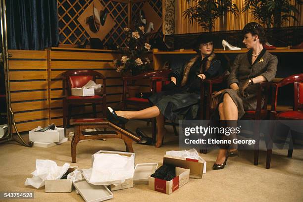 French actresses Isabelle Huppert and Miou-Miou on set of the film Coup de Foudre , directed by French director Diane Kurys and based on Olivier...