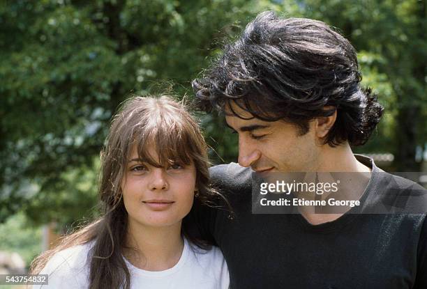 French actor Richard Berry and French actress Marie Trintignant on the set of the film "Premier Voyage" , directed by her mother, French director...