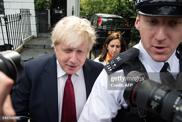 Former London Mayor, Boris Johnson, and his wife Marina are pictured as they leave their home in London on June 30, 2016. Brexit campaigner Michael...