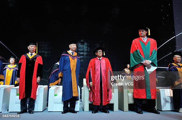 China's former NBA star Yao Ming and Chinese entrepreneur Li Ka-shing attend graduation ceremony of Shantou University on June 30, 2016 in Shantou,...