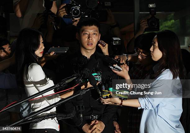 Pop Star Park Yoo-Chun arrives at the Gangnam Police Station on June 30, 2016 in Seoul, South Korea. Park Yoo-chun, a member of popular K-pop boy...