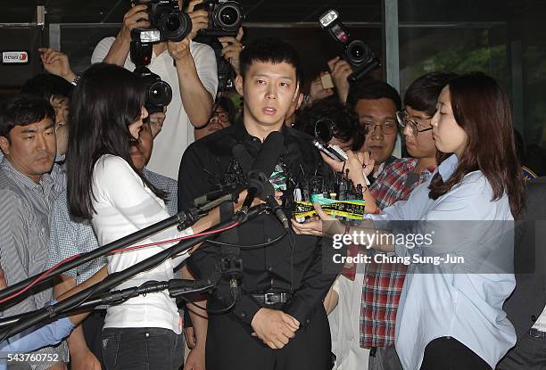 Pop Star Park Yoo-Chun arrives at the Gangnam Police Station on June 30, 2016 in Seoul, South Korea. Park Yoo-chun, a member of popular K-pop boy...