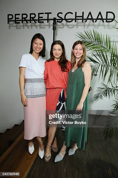 Designer Tutia Schaad, actress Hannah Herzsprung and designer Johanna Perret attend the Perret Schaad show during the Mercedes-Benz Fashion Week...