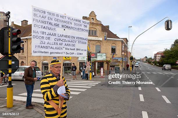 Diksmuide, West Flanders, August 28; 2011...A man dressed as a prisoner demostrate during the 84th Pilgrimage of the Yser . The pilgrim is a homage...