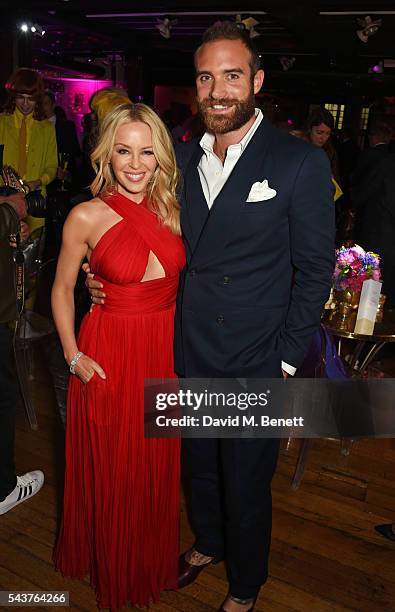 Kylie Minogue and Joshua Sasse attend the World Premiere after party of "Absolutely Fabulous: The Movie" at Liberty on June 29, 2016 in London,...