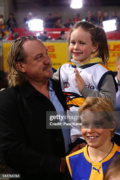 Daniel Chick looks on with his children before walking a lap of honour with team mates celebrating the West Coast Eagles 2006 Premiership anniversary...