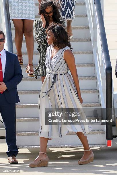 First Lady Michelle Obama and her daughter Malia Obama arrive at Torrejon Air Force Base on June 29, 2016 in Madrid, Spain. The First Lady will...