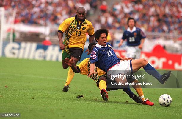 Franck Sinclair and Shinji Ono during the Japan vs. Jamaica soccer game at the 1998 soccer World Cup.